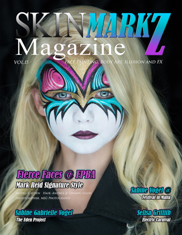 body painting magazine featuring a blonde model on the cover in face paint painted by Mark Reid